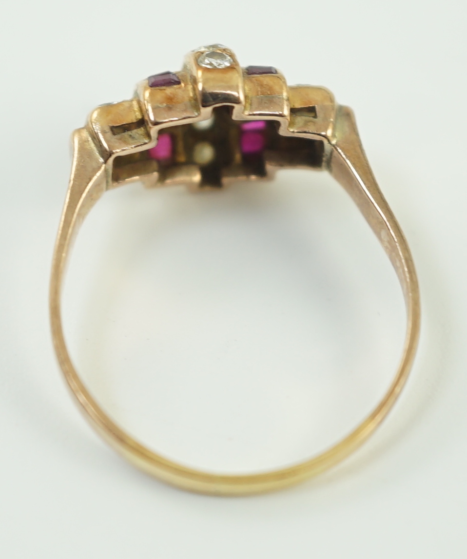 A 1950's gold and graduated five row ruby and diamond set demi lune dress ring